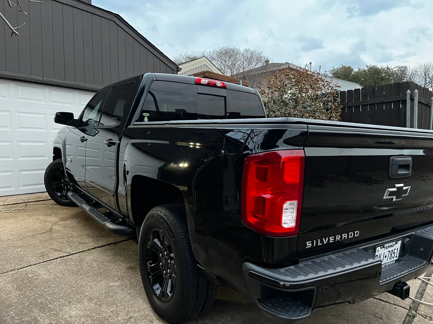 Chevy Silverado Z71 rear angle showing bed and blacked-out wheels