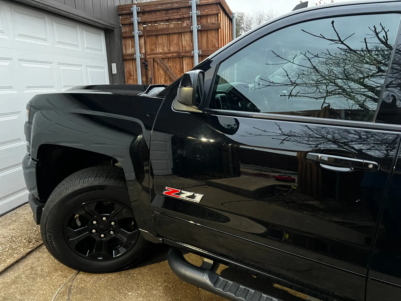 Chevy Silverado Z71 driver side with gloss reflection